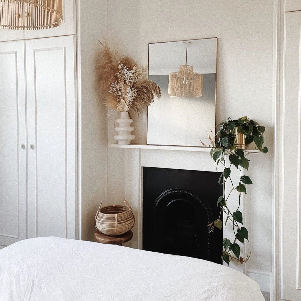 Dourado Rectangular Metal Wall Mirror on mantlepiece